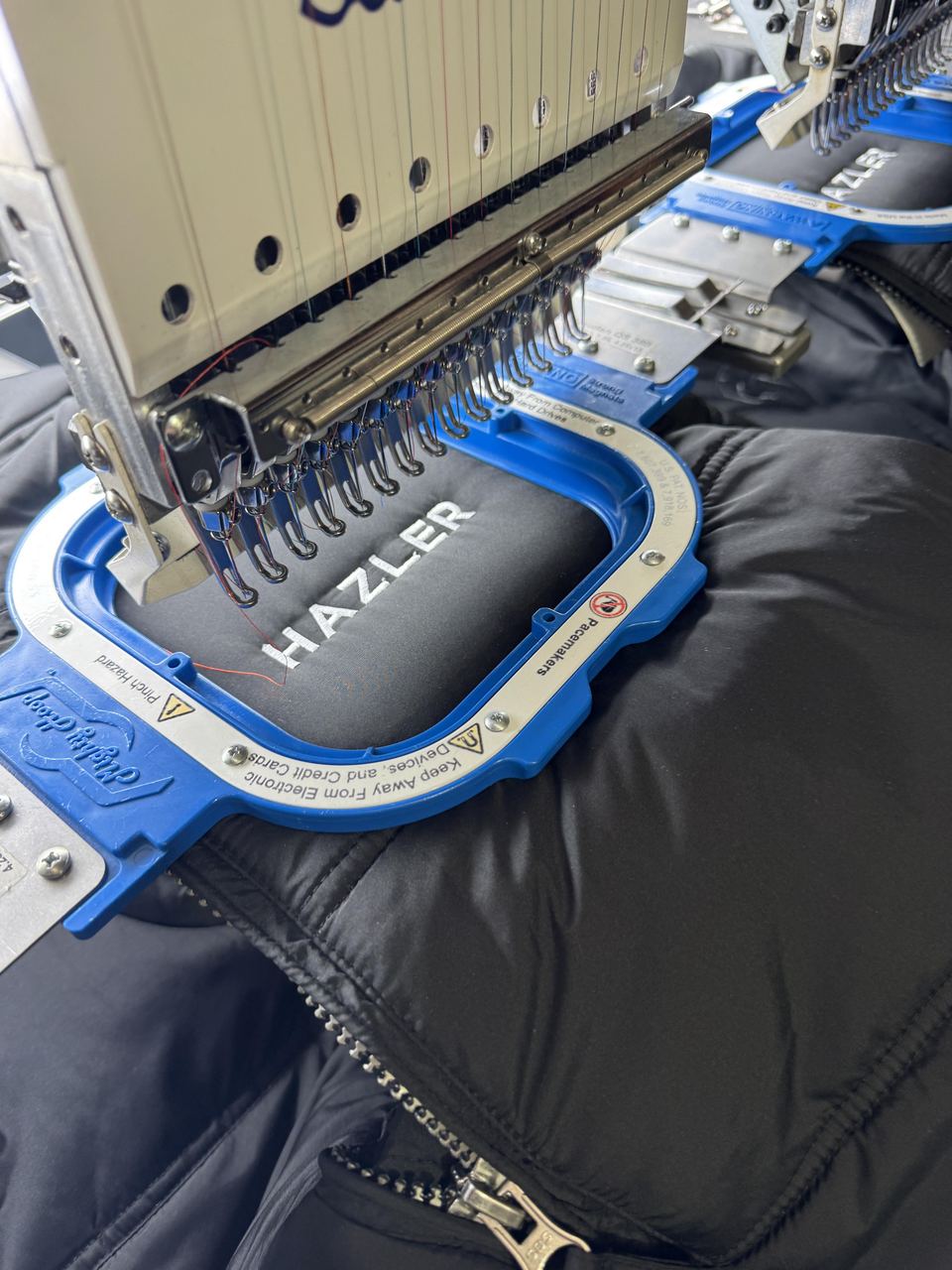 In-house embroidery on polos, jackets and hi-vis